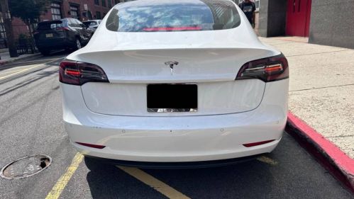 2018 Tesla Model 3 5YJ3E1EB1JF122058